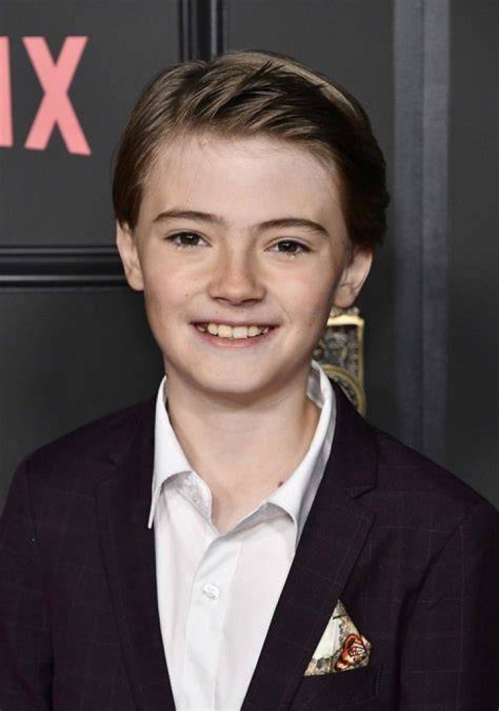 Jackson Robert Scott as seen while smiling for a picture alongside his sister in November 2019