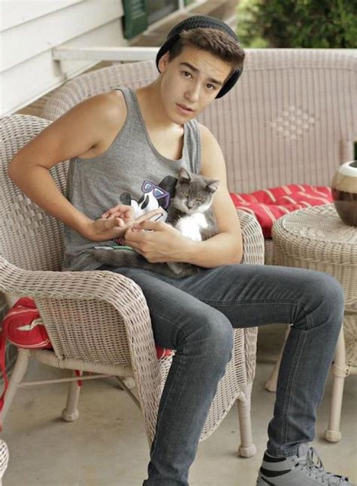 Jacob Whitesides with his cat
