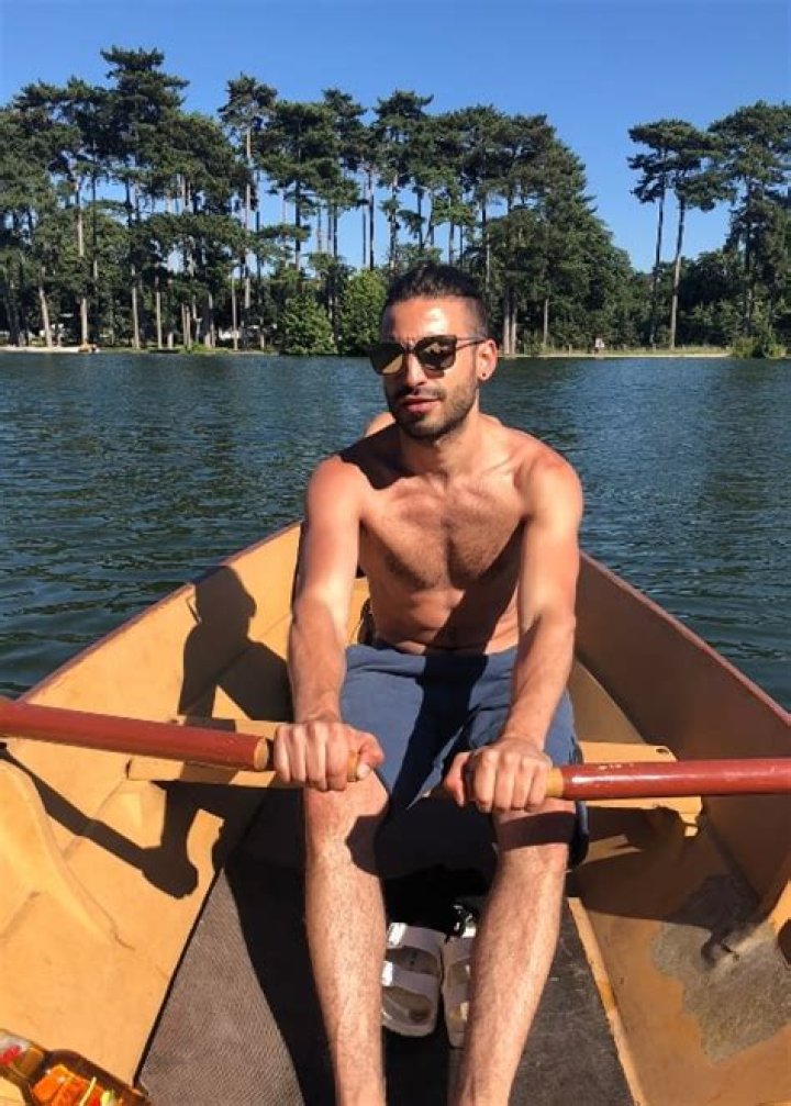 Jade Hassoun&eacute; as seen shirtless while rowing a boat in Lac du Bois de Boulogne in June 2018