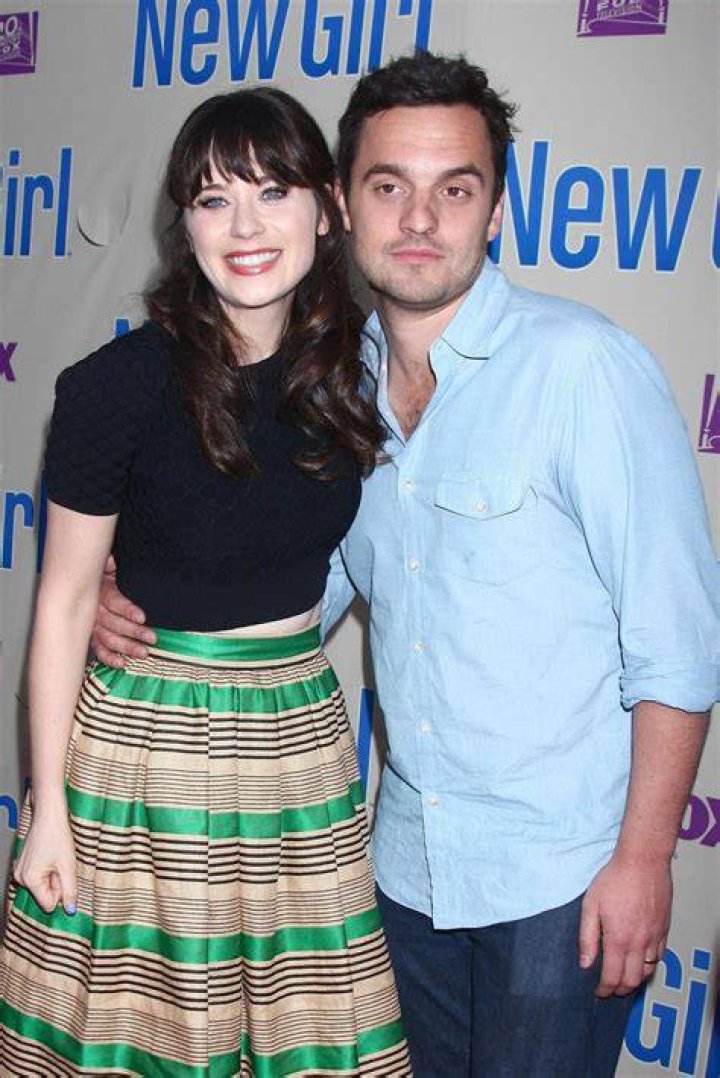 Jake Johnson and Zooey Deschanel in May 2016
