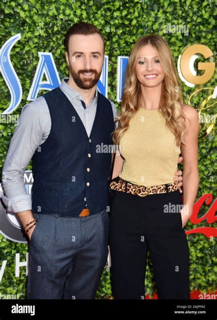 James Hinchcliffe with Rebecca Dalton at a racing event in 2015