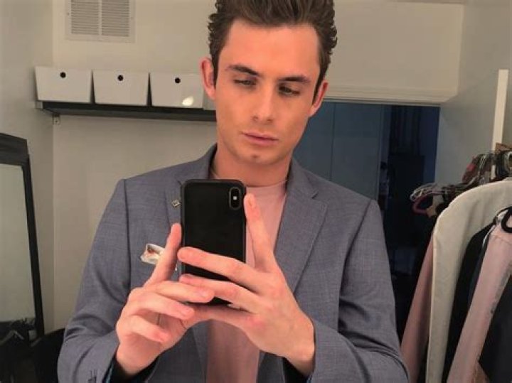 James Kennedy clicking a selfie with Raquel Leviss and their dog in December 2020