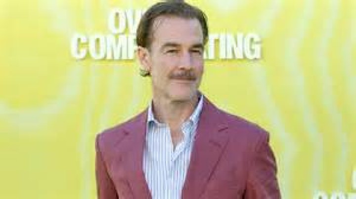 James Van Der Beek taking a selfie with Kimberly Van Der Beek and their child