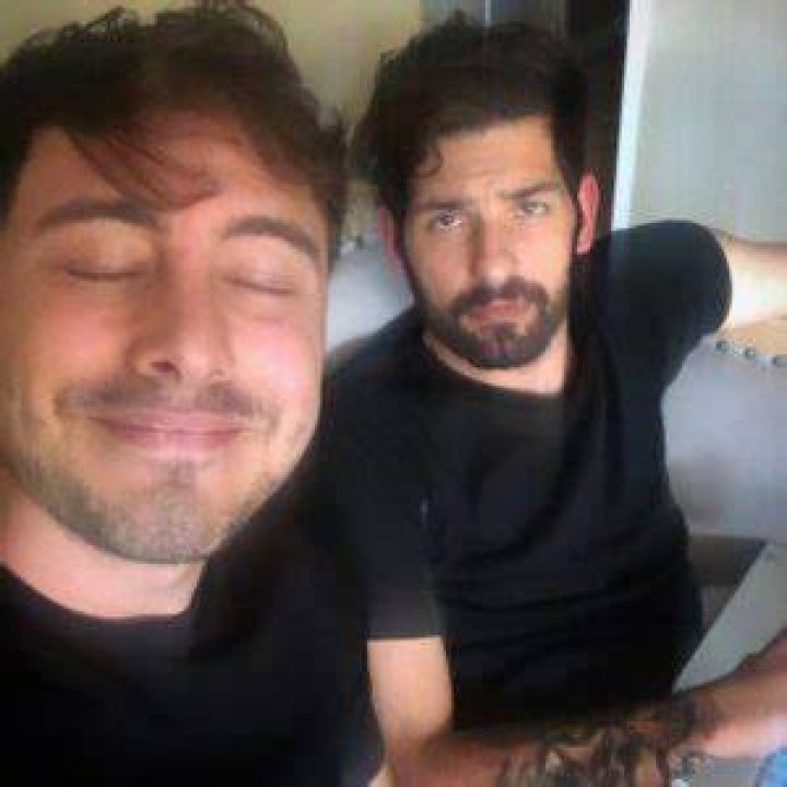 Jarod Einsohn (Left) as seen while smiling for a picture with Garrett Jason Greer in August 2021