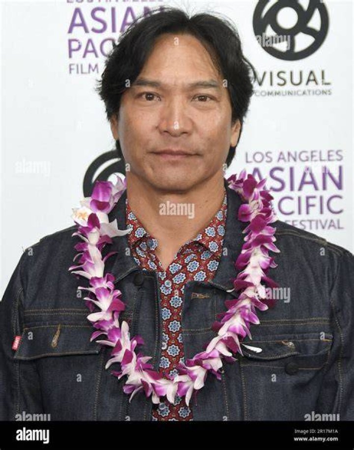 Jason Scott Lee taking a selfie with his food in November 2018