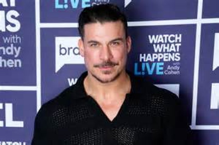 Jax Taylor posing for a picture alongside his pregnant wife Brittany Cartwright during a date night in November 2020