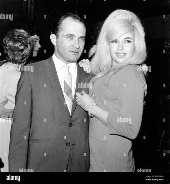 Jayne Mansfield and her lawyer-boyfriend Sam Brody posing for a photo before a trip to Frankfurt am Main, Germany in 1967