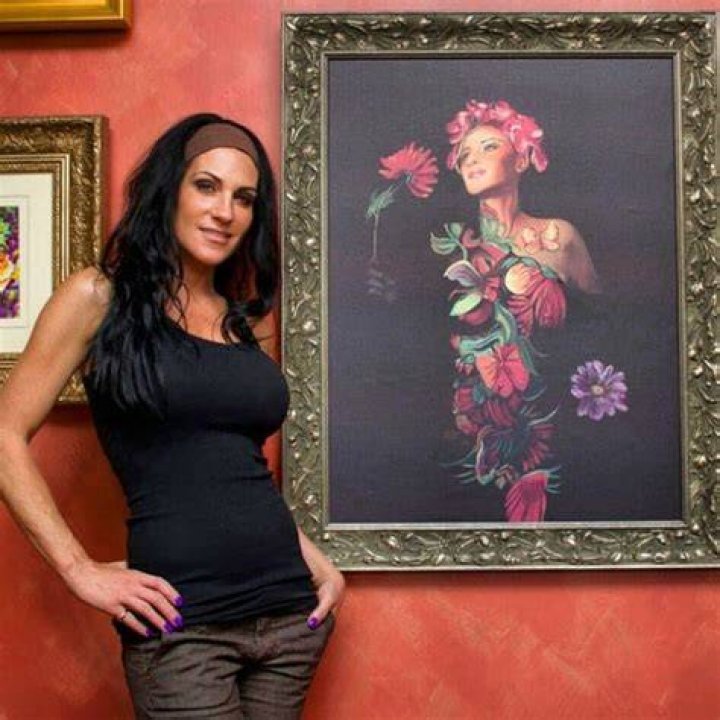 Jen Seidel in May 2015 with one of her fine art paintings of her bodypainted models