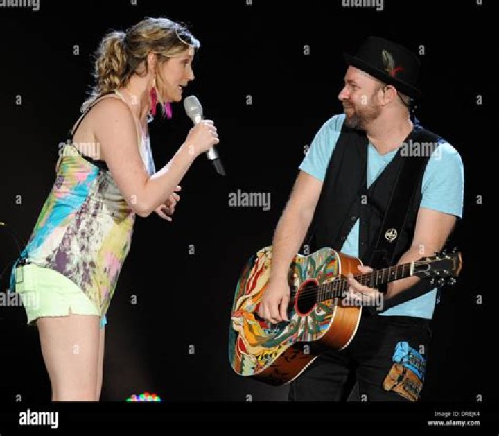 Jennifer Nettles and Kristian Bush (foreground) with Annie Clements (background) perform at MyCokeFest at Centennial Olympic Park in Atlanta, Georgia in April 2007