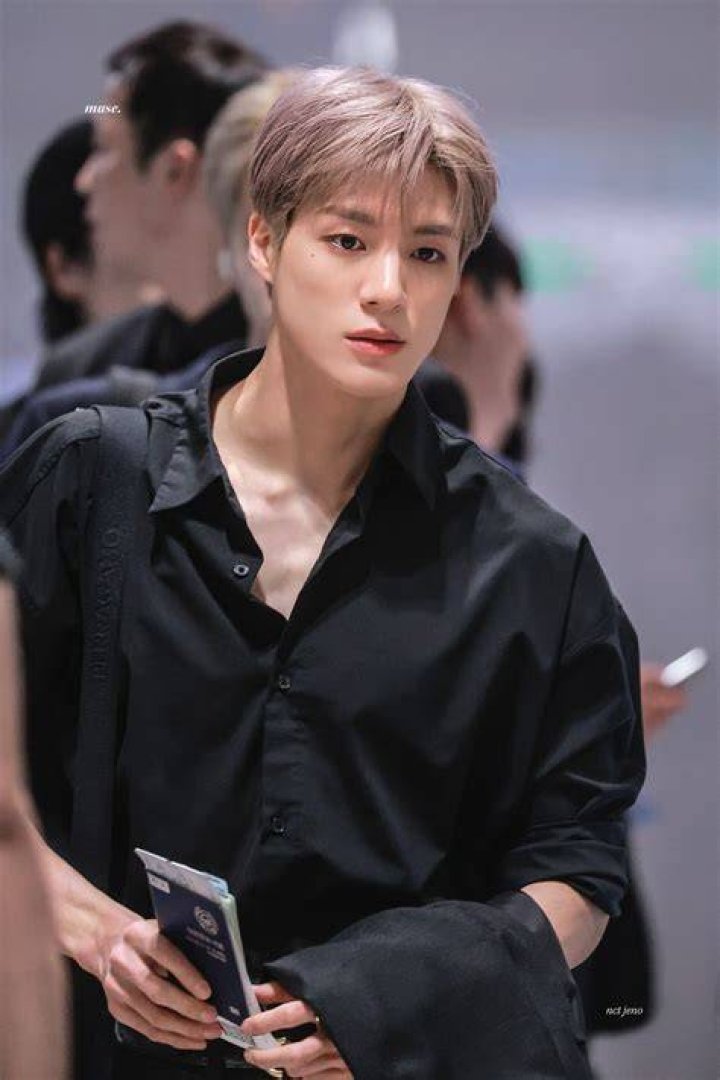 Jeno with a plate of cakes in October 2017