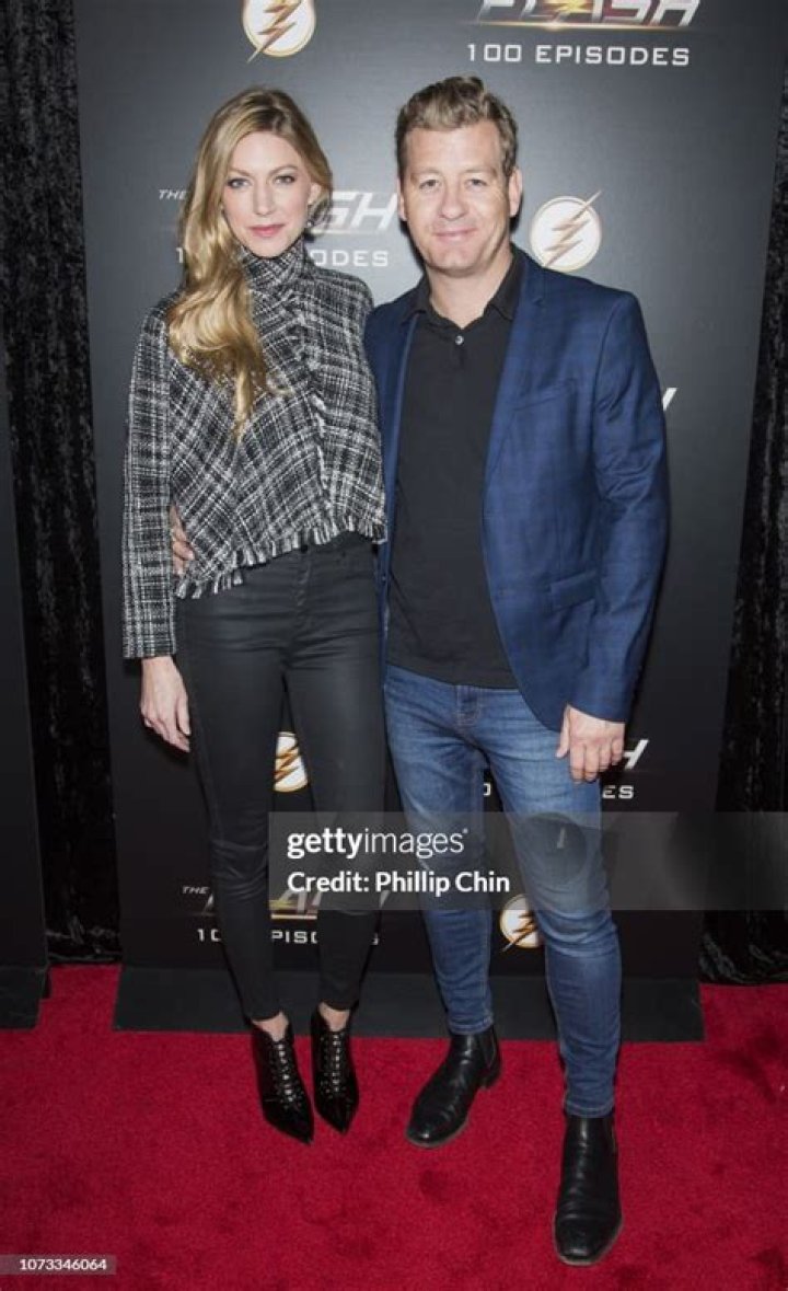 Jes Macallan with Nicholas Bishop during her younger sister's wedding in June 2018