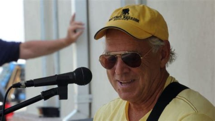 Jimmy Buffet performs for members of Joint Task Force Haiti behind the U.S. Embassy in Port-au-Prince, Haiti, March 3, 2010