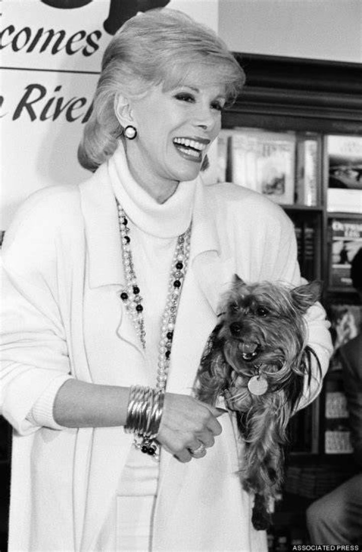 Joan Rivers smiling for a photograph at the USO luncheon at The Pierre hotel in New York City on May 24, 2001