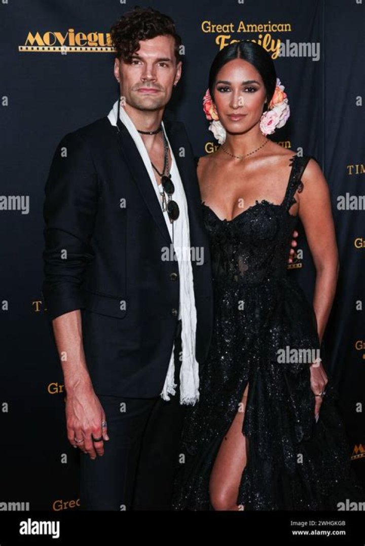 Joel Smallbone and wife Moriah Peters posing for a picture along with Dolly Parton (Center) in Nashville, Tennessee