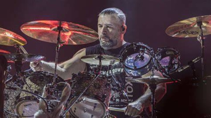 John Dolmayan as seen while playing the drums on stage in January 2018