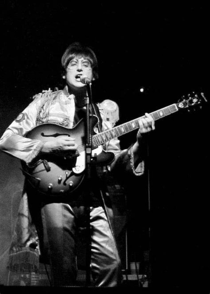 John Lennon as seen while performing during an event