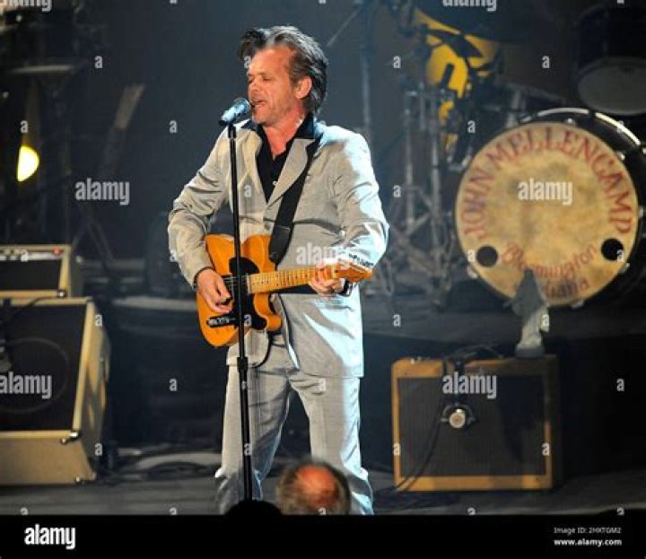 John Mellencamp (right) seen performing at Walter Reed Army Medical Center in 2007