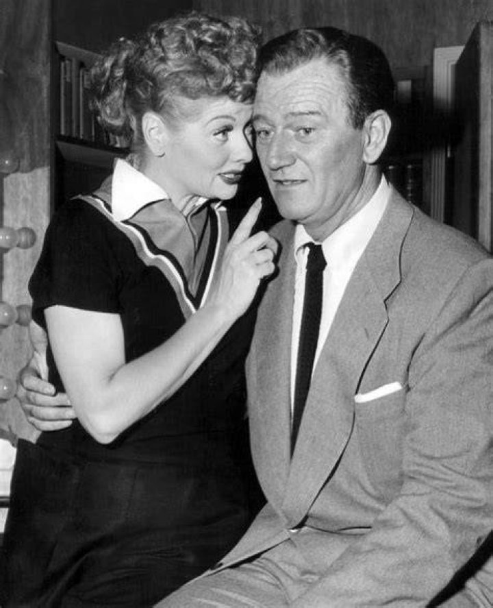 John Wayne and Lucille Ball in a publicity photo from the television program 'I Love Lucy'