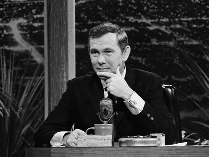 Johnny Carson as seen while reading a story with his three sons (From Left to Right - Kit, Cory, and Ricky) in 1955