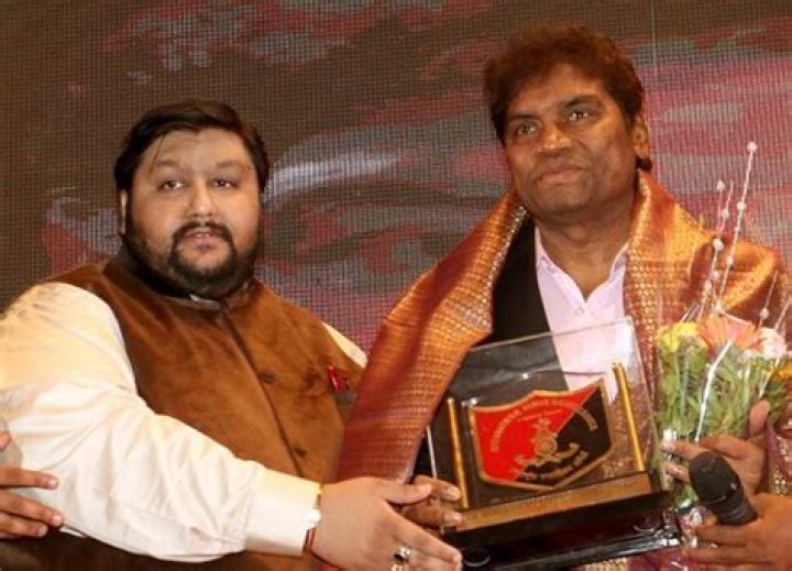 Johnny Lever seen being awarded during the 4th edition of Dr. Babasaheb Ambedkar Nobel Awards 2019