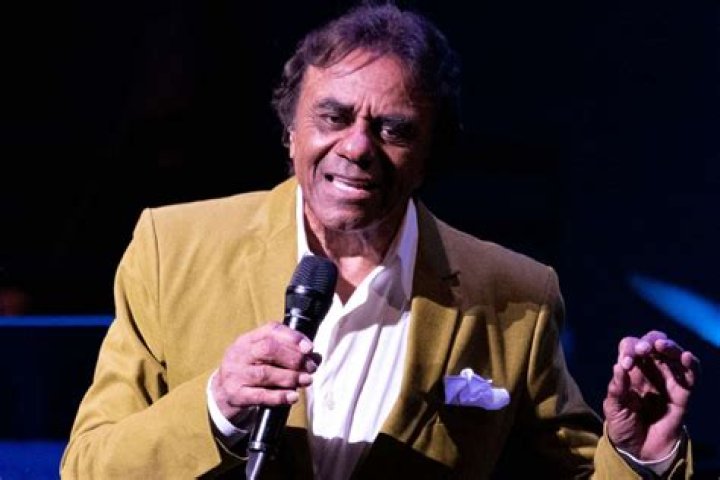 Johnny Mathis as seen in a black-and-white picture