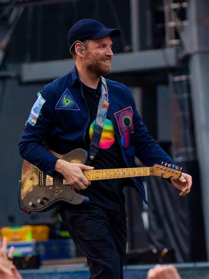 Jonny Buckland performing with Coldplay in Japan at the 2011 Fuji Rock Festival