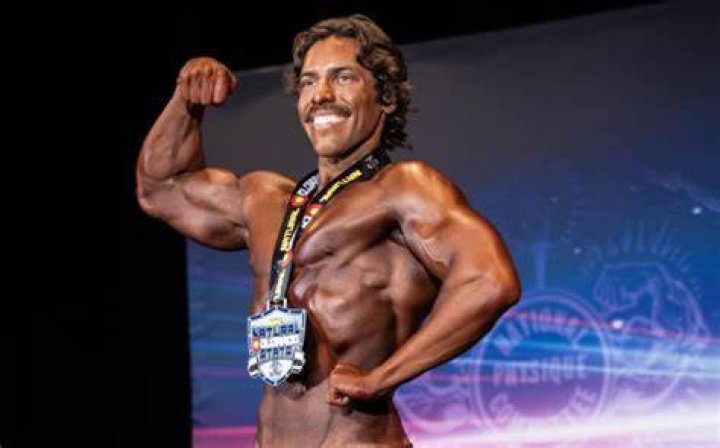 Joseph Baena posing for the camera showing his stunning physique in March 2021
