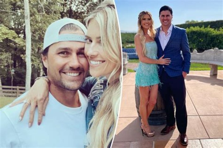 Joshua Hall a seen in a picture with his wife Christina and his mother in June 2022, in Newport Beach, California