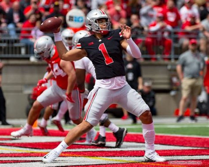 Justin Fields with the Ohio State Buckeyes as seen while attempting a pass during a game against the Clemson Tigers in the 2019 Fiesta Bowl