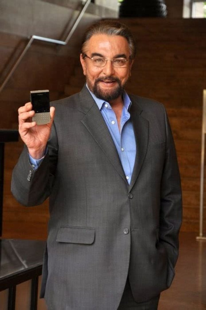 Kabir Bedi as seen while posing for the camera with Blackberry-Porsche Design P'9981 mobile