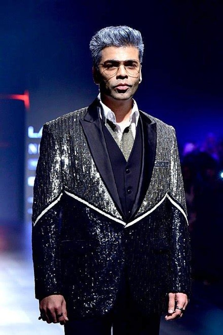 Karan Johar walks the ramp for Shane and Falguni Peacock in February 2018
