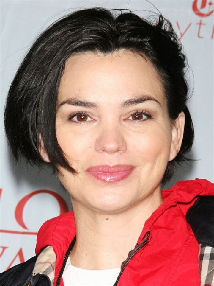 Karen Duffy smiling in a selfie alongside husband John Lambros in June 2018