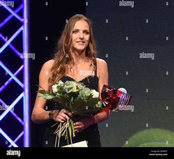 Karolina Pliskova holds the award for a second place at the 2016 US Open after losing to Angelique Kerber of Germany in the finals