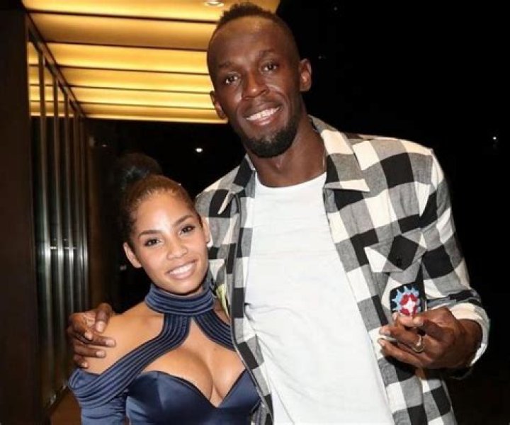 Kasi Bennett with her beau Usain Bolt and his kids Olympia Lightning, Saint Leo, Thunder Bolt in December 2021