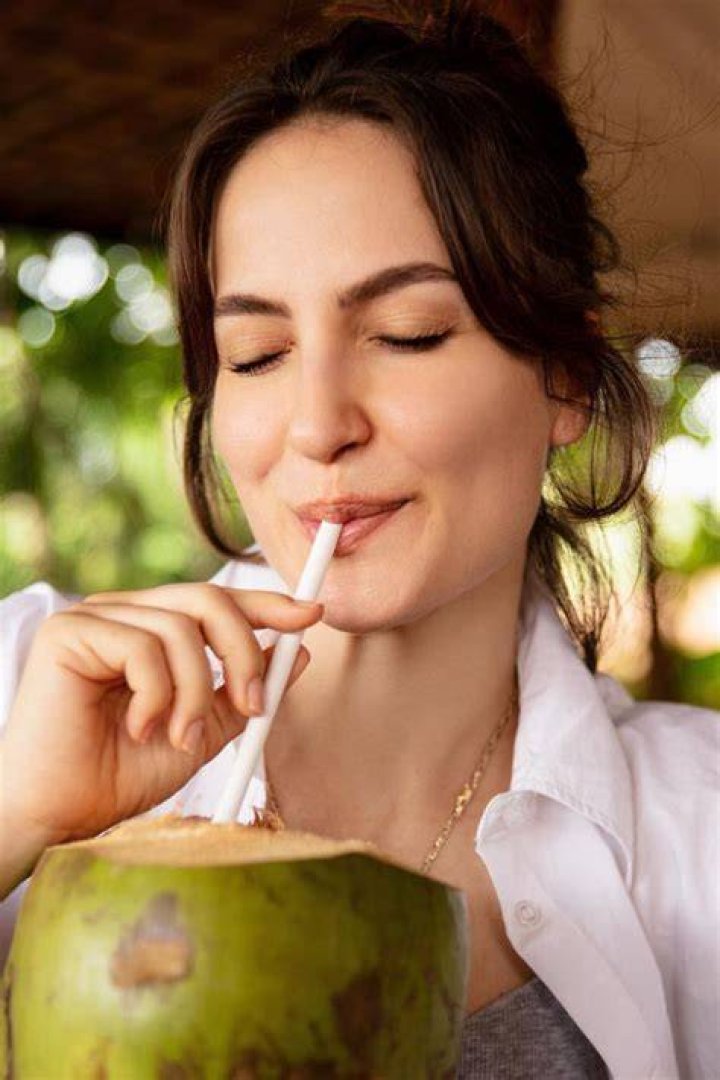 Kate Hudson drinking coconut water