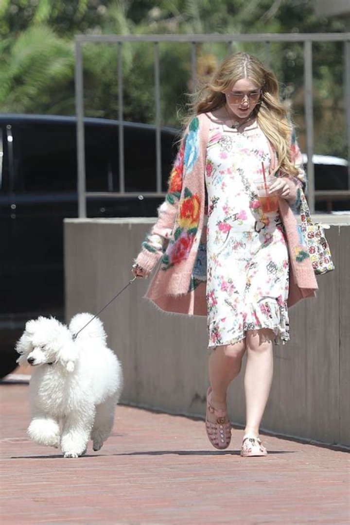 Kathryn Newton with her dog as seen in December 2017