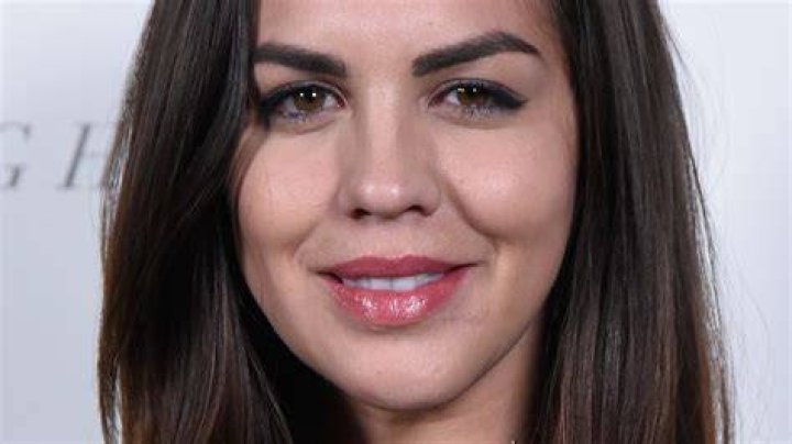 Katie Maloney-Schwartz smiling in a picture alongside Tom Schwartz