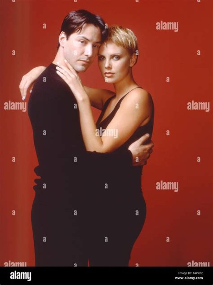 Keanu Reeves and Charlize Theron at the 58th Annual Golden Globe Awards in January 2001