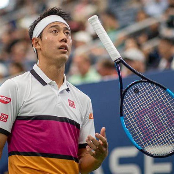 Kei Nishikori during a match against Julien Benneteau at 2016 Wimbledon on June 30, 2016 in London, England