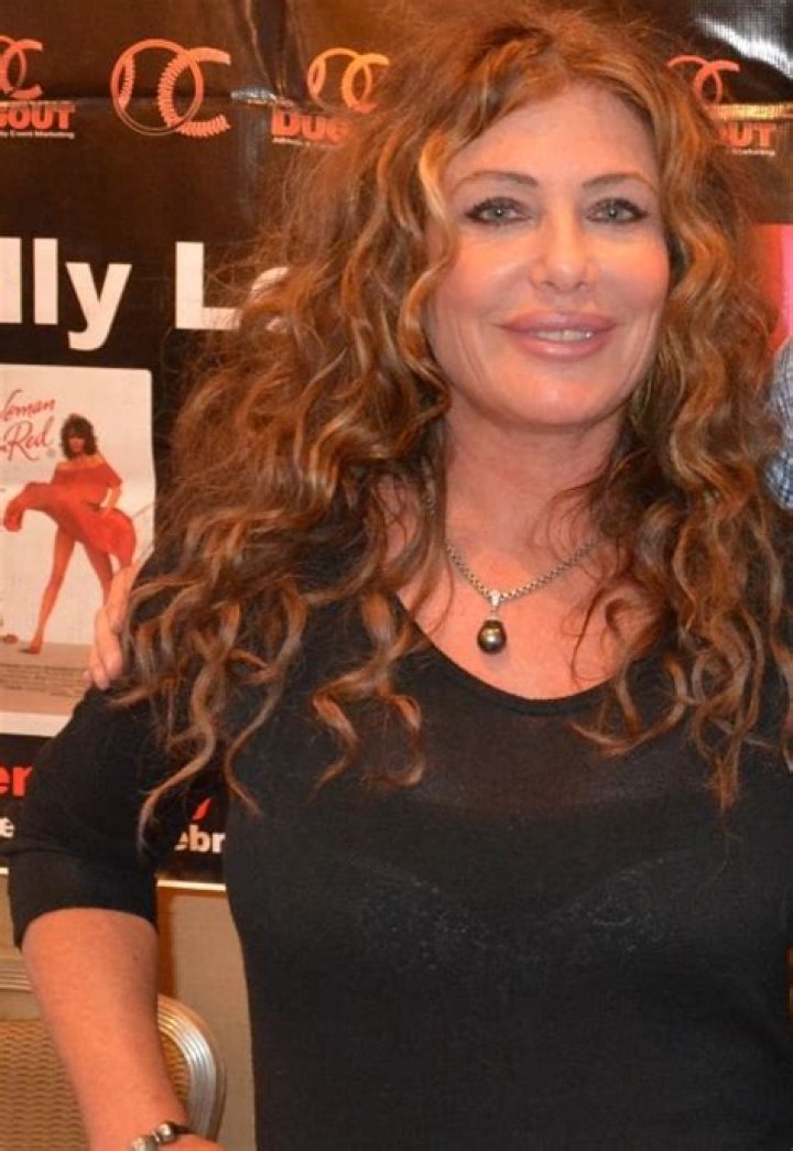 Kelly LeBrock as seen while smiling for a picture at the Chiller Theatre Expo at the Sheraton Parsippany Hotel in Parsippany, New Jersey in October 2014
