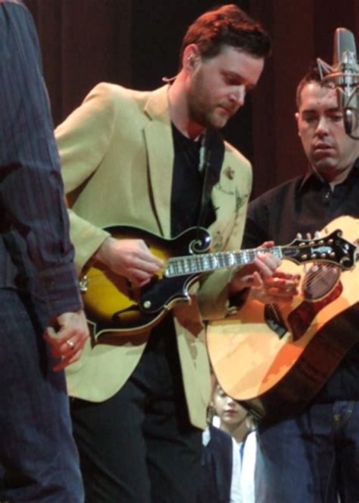 Kevin Hearn plays the mandolin at Massey hall with fellow Barenaked Ladies, Steven Page (left) and Ed Robertson (right) in November 2005