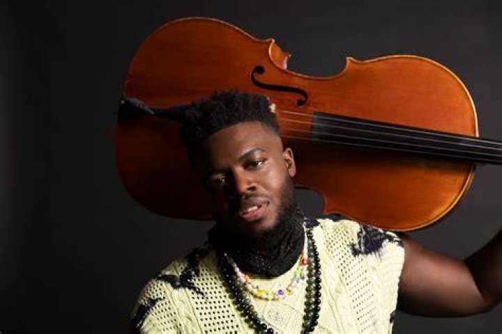 Kevin Olusola performing with Pentatonix in April 2015