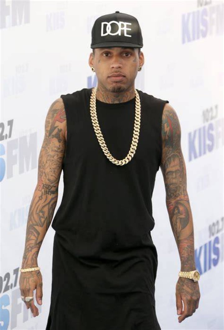 Kid Ink poses for a modeling photoshoot in 2016