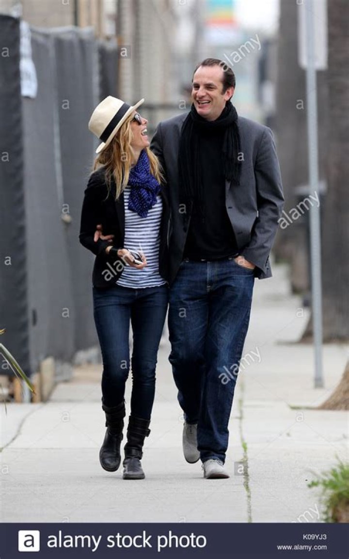 Kim Raver with husband Manuel Boyer at an event organized by Vanity Fair in 2012