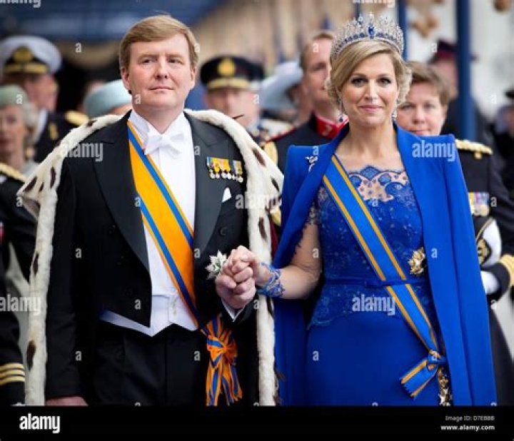 King Willem-Alexander, Queen Maxima, and Princesses Catharina-Amalia, Alexia, and Ariane pictured during the balcony scene after the abdication of Beatrix in May 2013