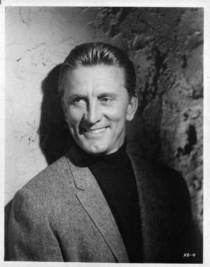 Kirk Douglas posing in a candid pose