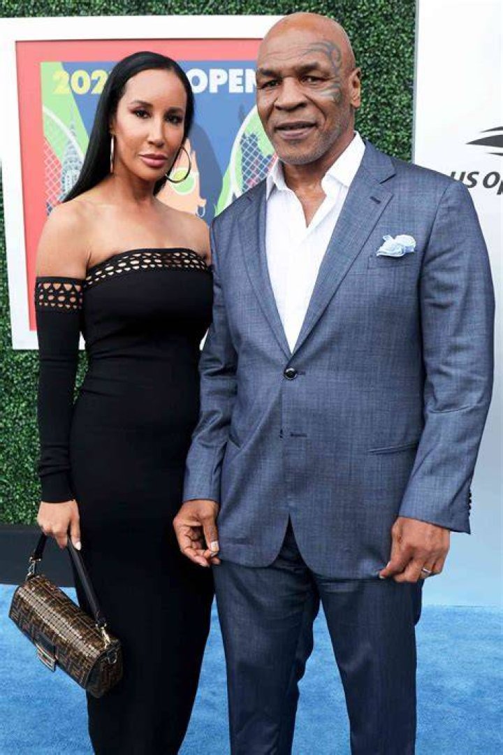 Lakiha Spicer and Mike Tyson at the "Taking on Tyson" New York premiere in March 2011