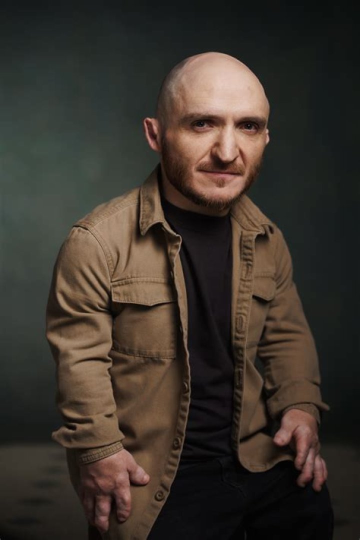 Leigh Gill smiling for a picture during his time at Posh Pads Apart-Hotel Liverpool in July 2020