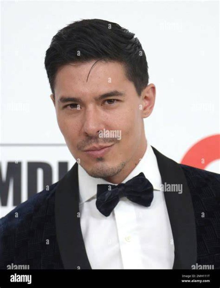 Lewis Tan in December 2020 wishing everyone a Merry Christmas