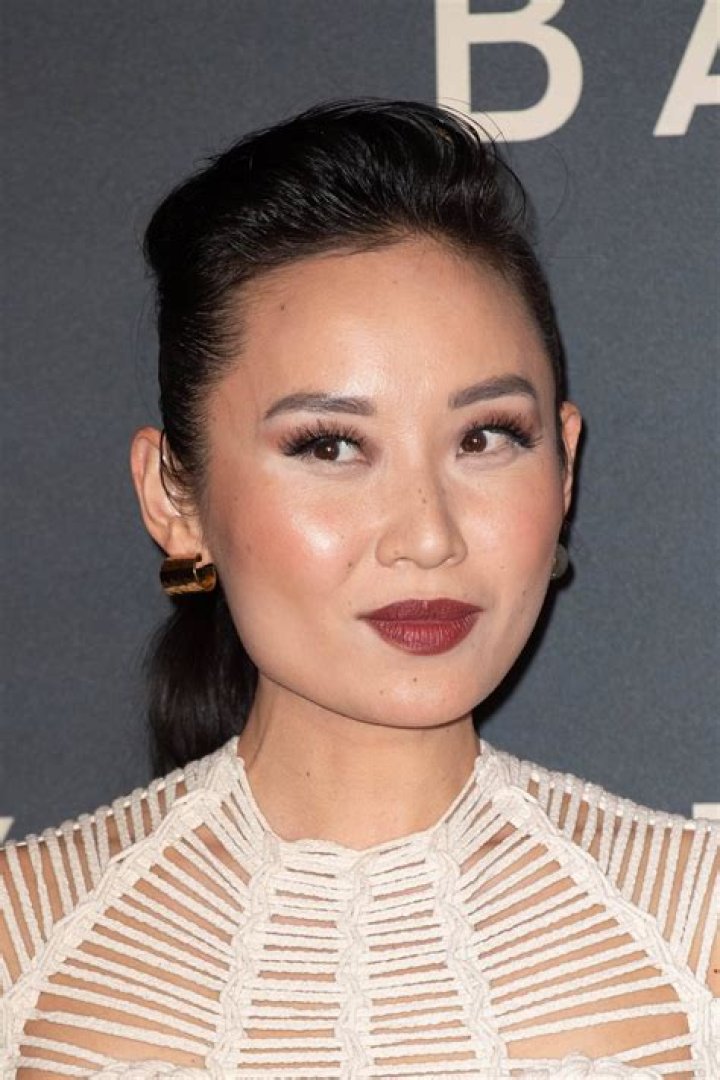Li Jun Li as seen while smiling for a picture in New York City, New York in May 2018